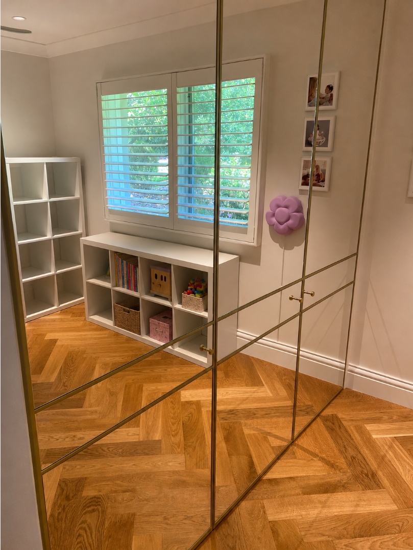 Bright Bedroom With Mirrored Wardrobe — JDS Kitchens & Detailed Joinery in Albion Park Rail, NSW