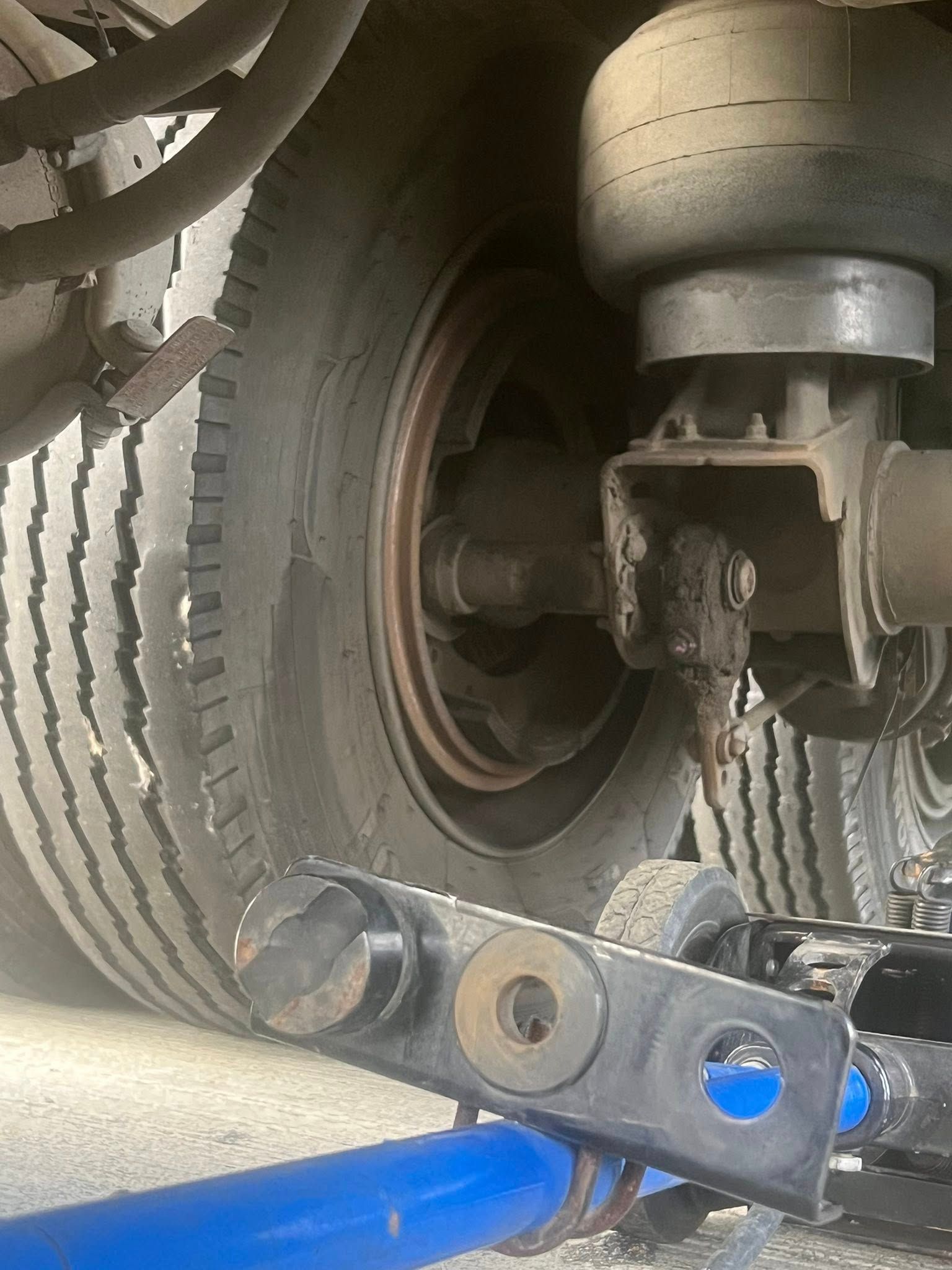 Close-up of a Truck Wheel and Suspension With a Damaged Brake or Axle Component — North Coast Heavy Diesel In Wauchope, NSW