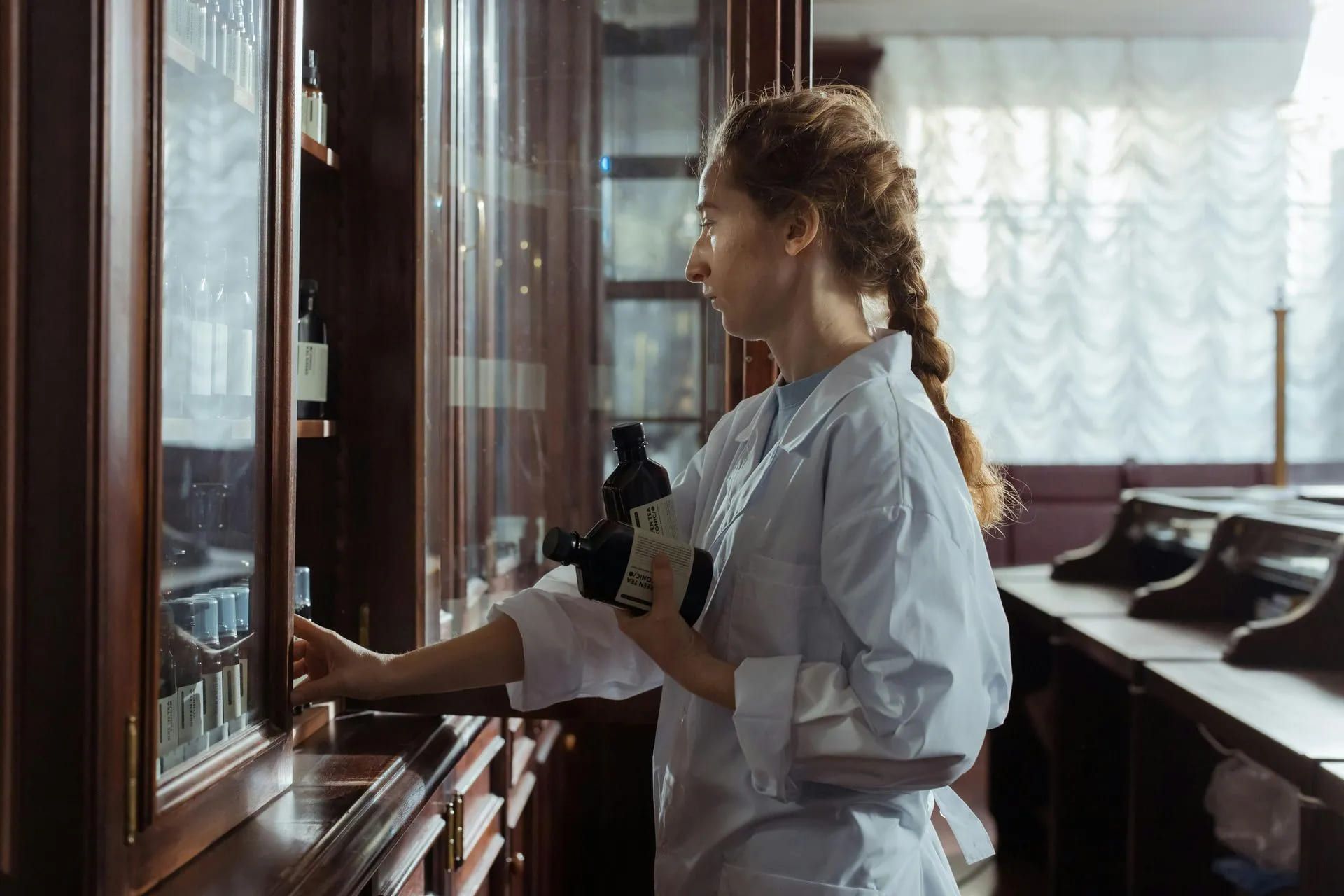 a woman working with cannabis medicine
