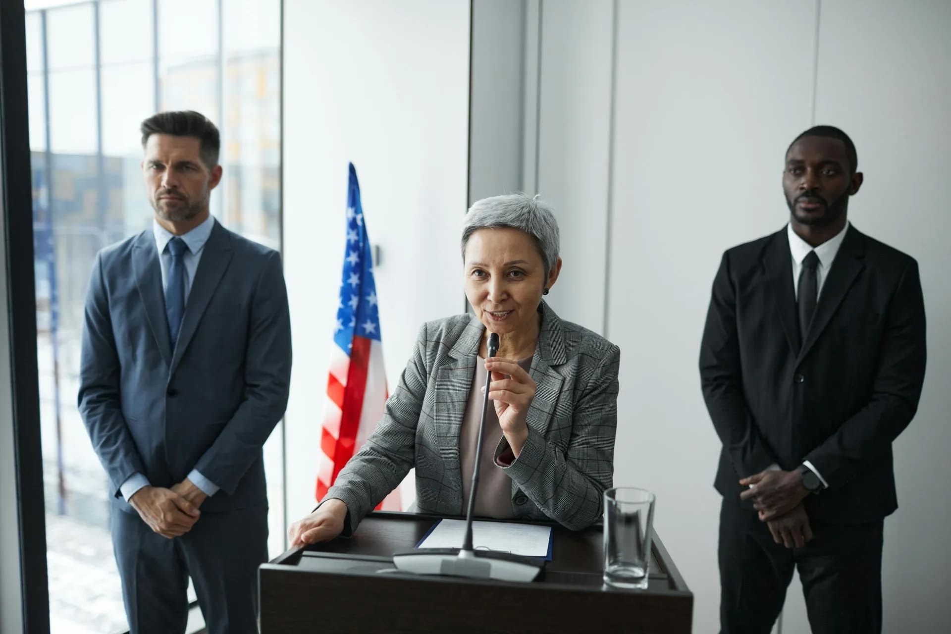 an executive with bodyguards