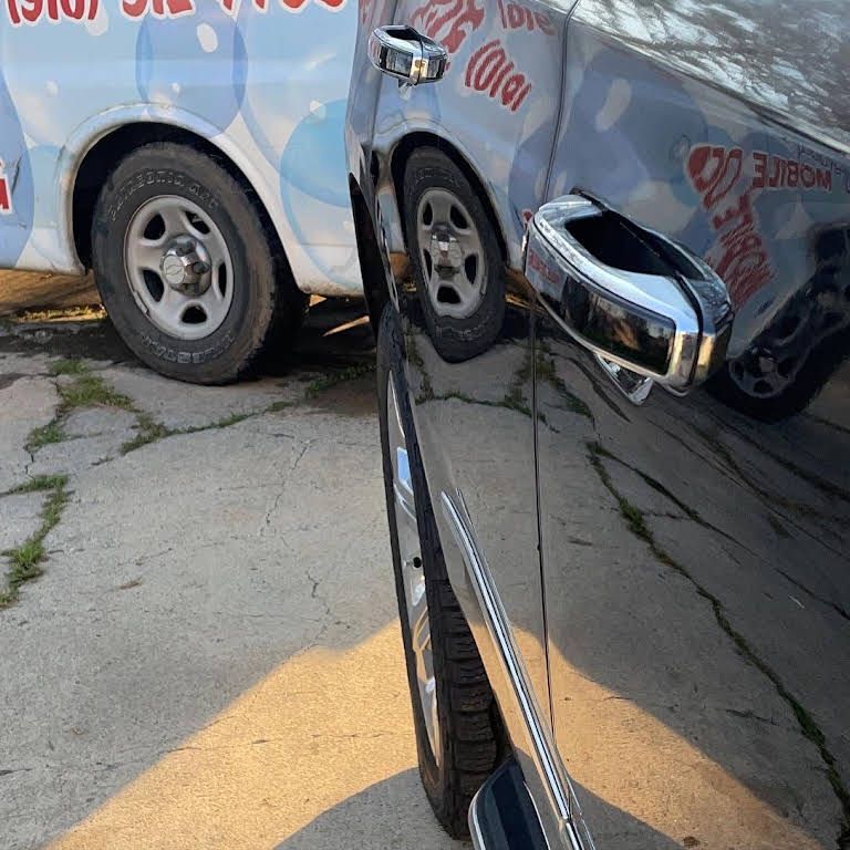 a blue and white van with the word bubbles on it