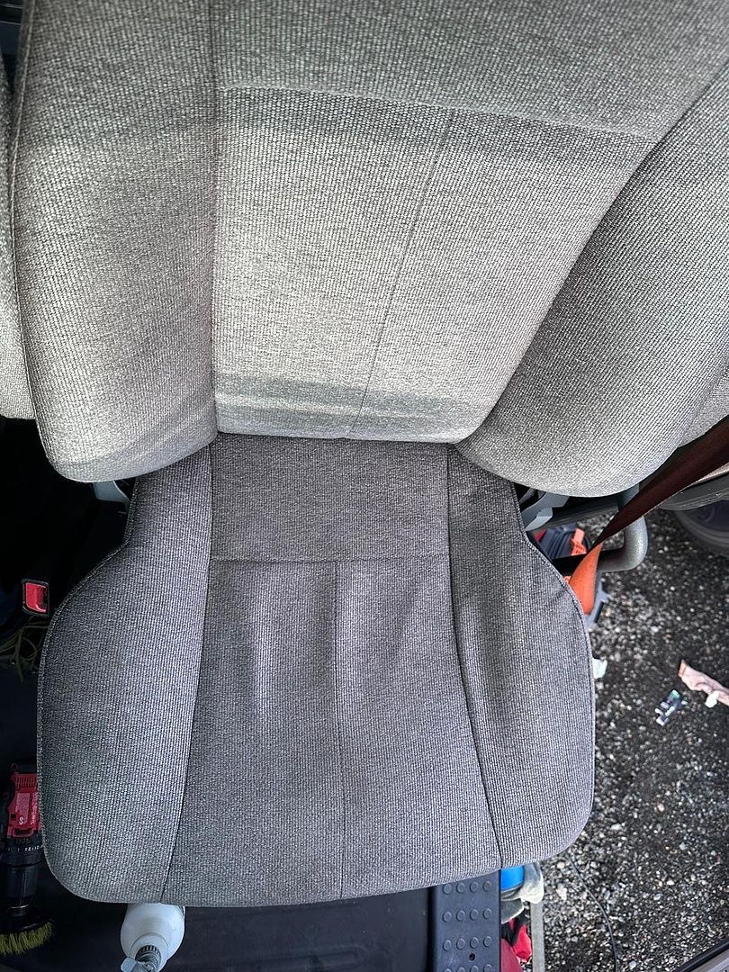 a close up of a car seat in a car .