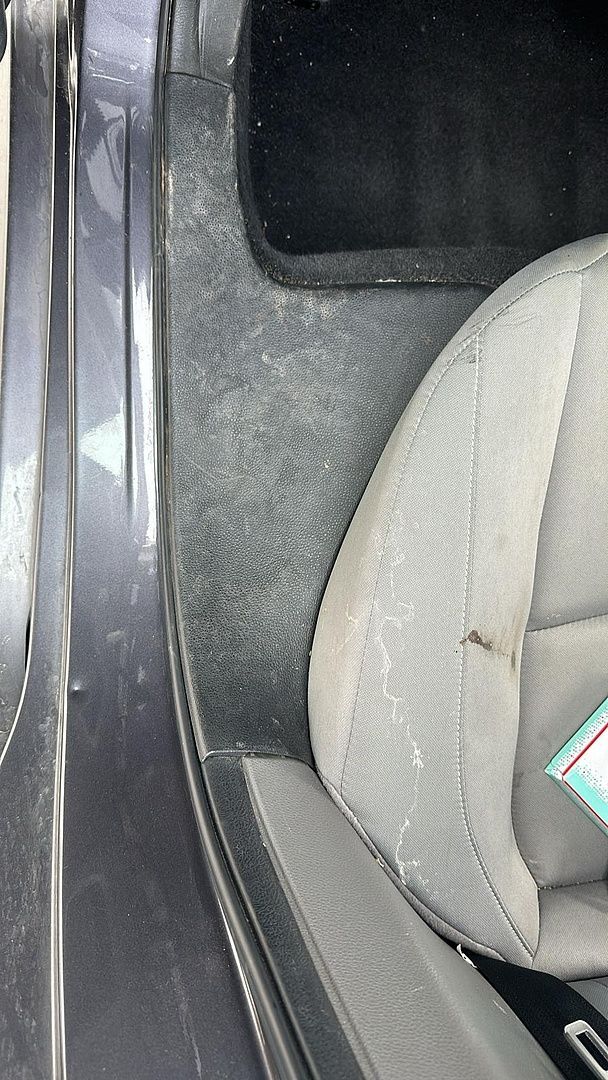 a close up of a car seat in a car .