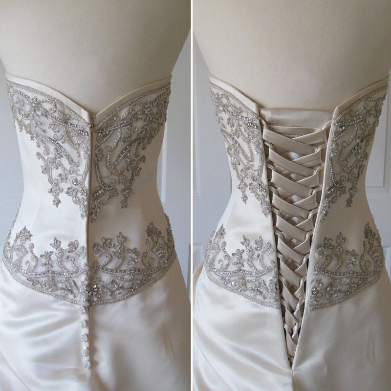 The back of a wedding dress with a lace up back