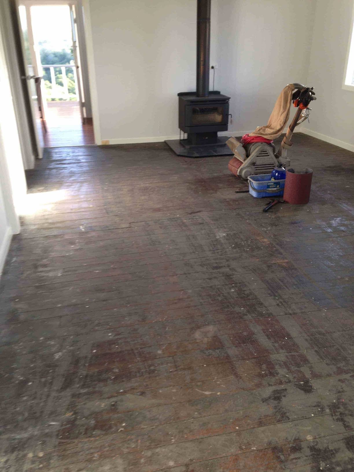Wood floor restoration with equipment — Flooring In Sharon, QLD