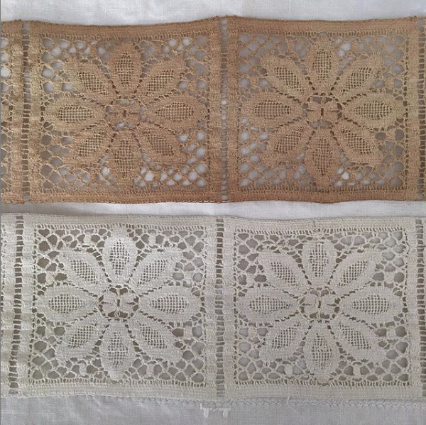 Two lace fabric panels, tan on top and white on bottom, with floral crochet patterns