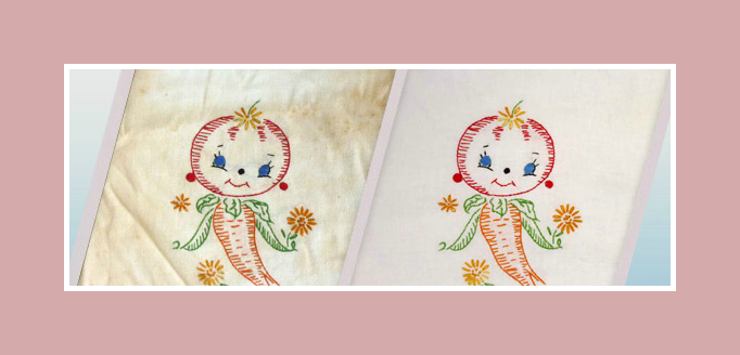 Two embroidered clown dolls with colorful outfits on cream fabric, shown side by side