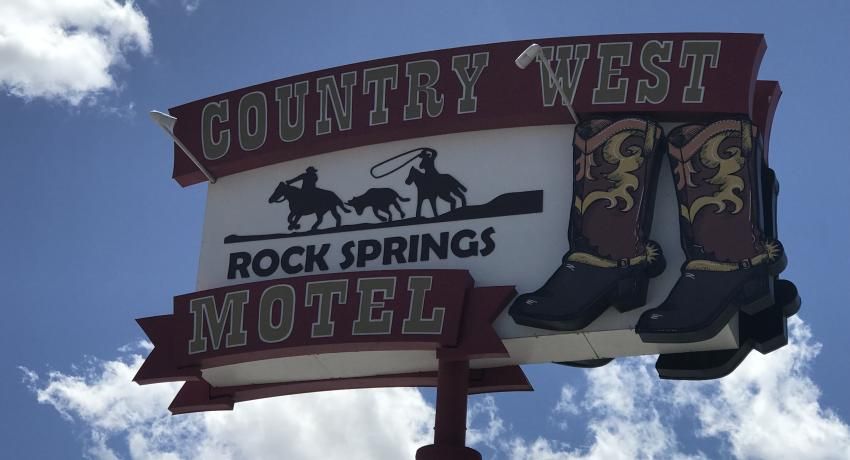A roadside motel sign in Rock Springs reading
