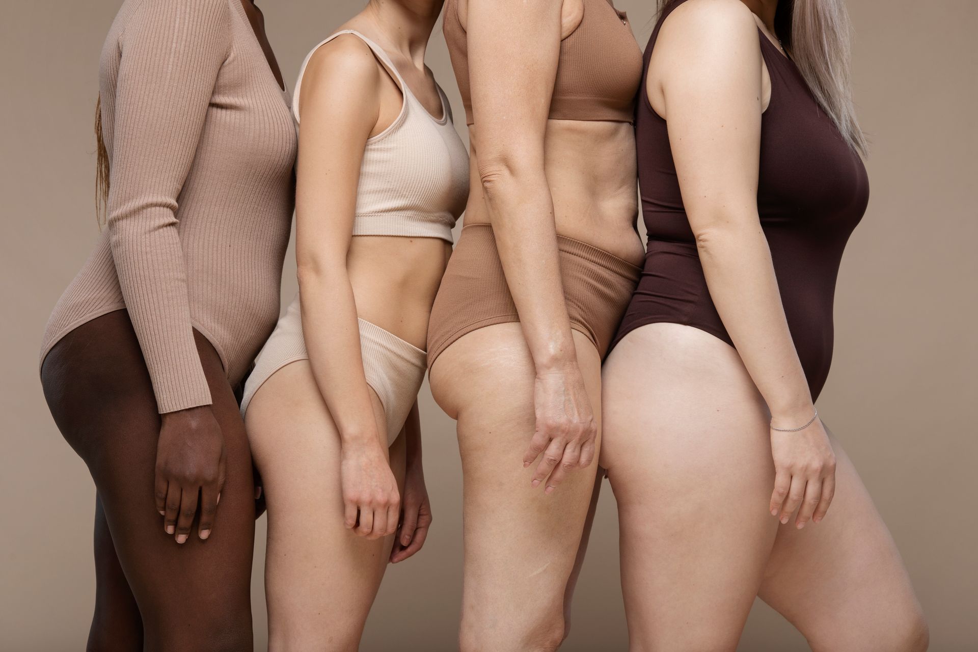 different woman standing together 