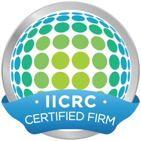 An iicrc certified firm logo with a blue ribbon