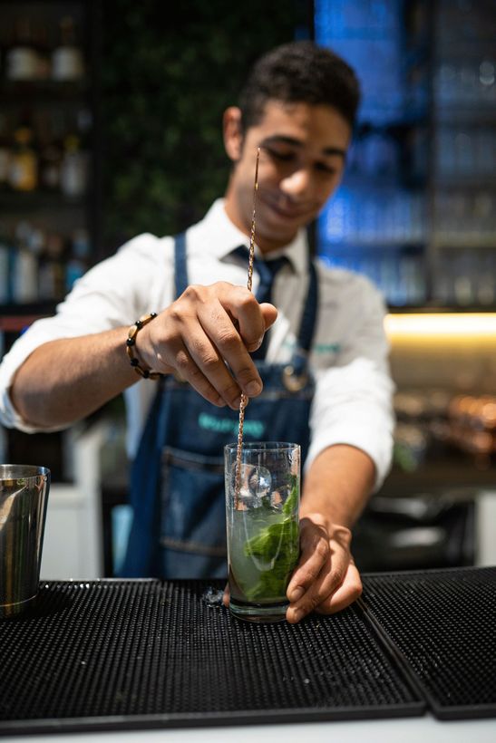bartender preparing a mojito