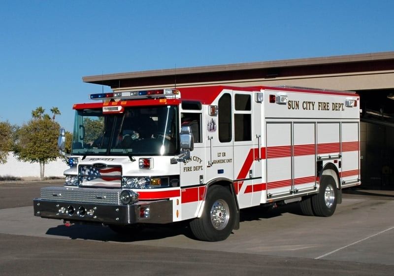 A red and white fire truck from the sun city fire department