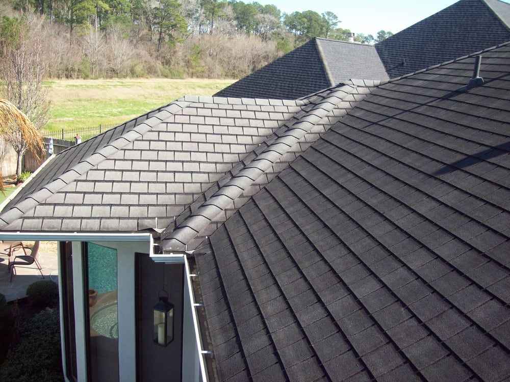 Grey Tile Roof — Killiby & Co Roofing Pty Ltd in Gold Coast, QLD
