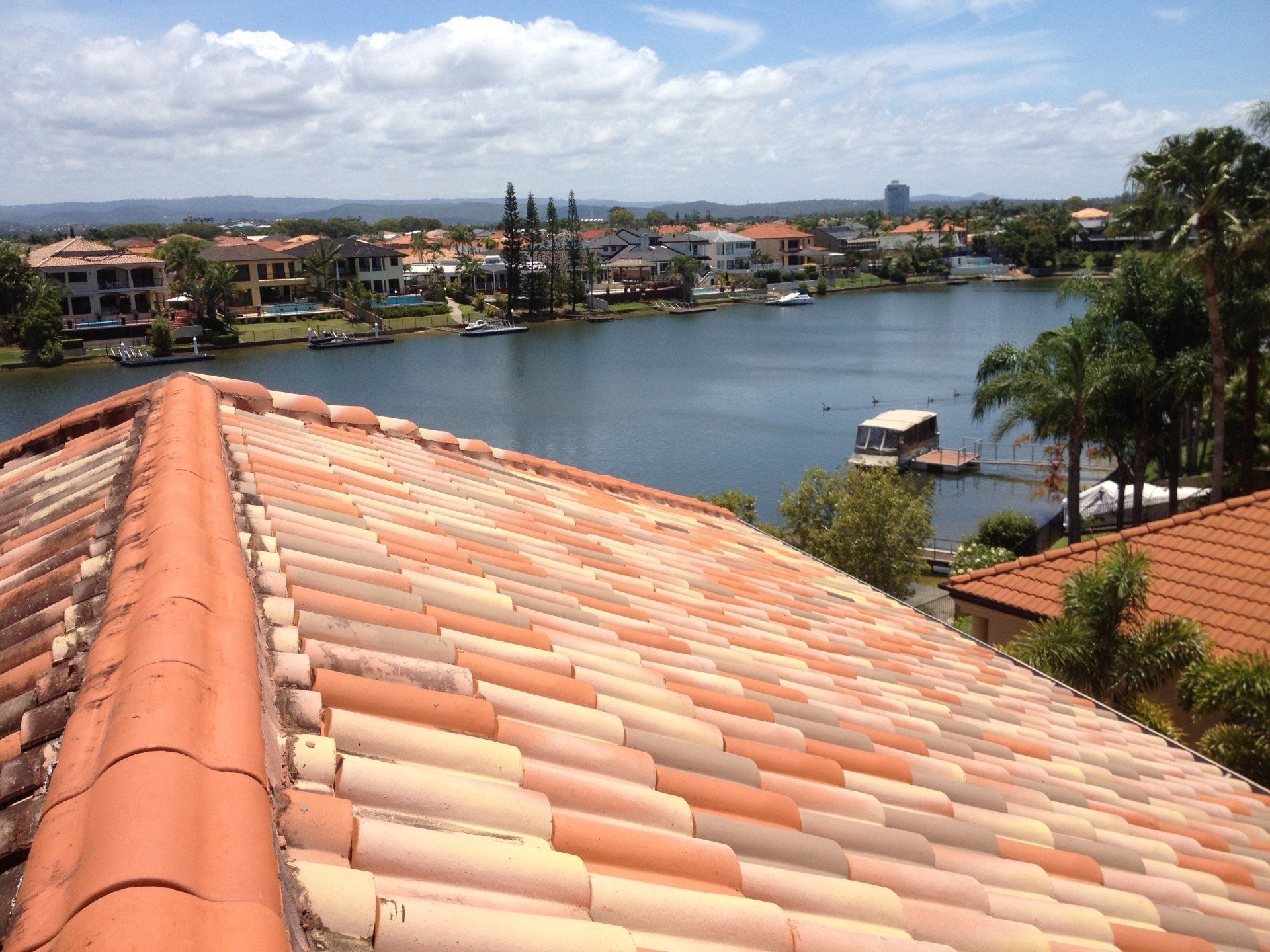 A View of a Lake From the Roof of a House — Killiby & Co Roofing Pty Ltd in Tweed, NSW