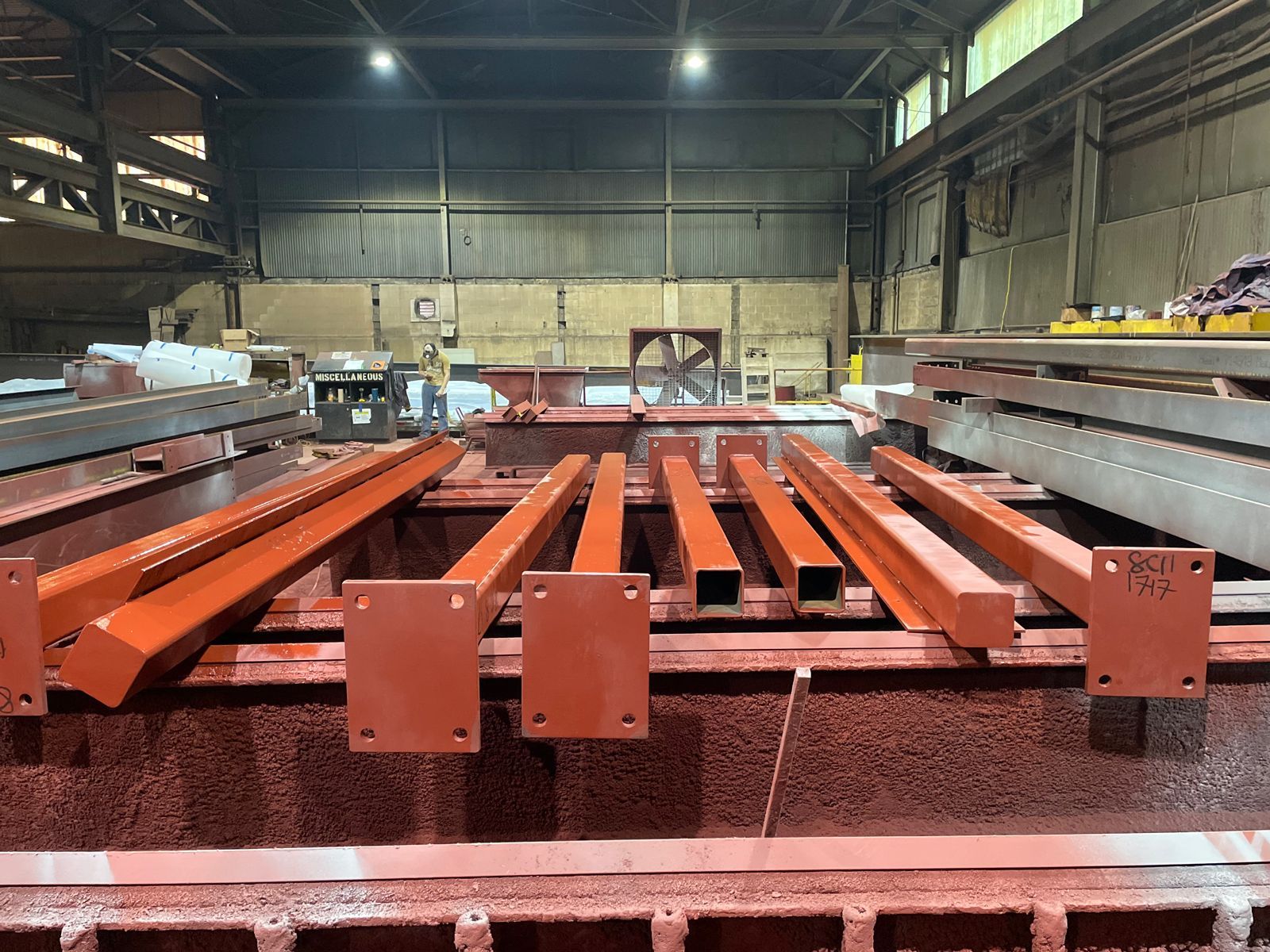 steel construction fabricated parts on a table
