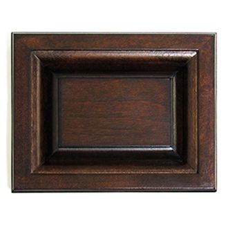 Dark brown raised panel cabinet door.
