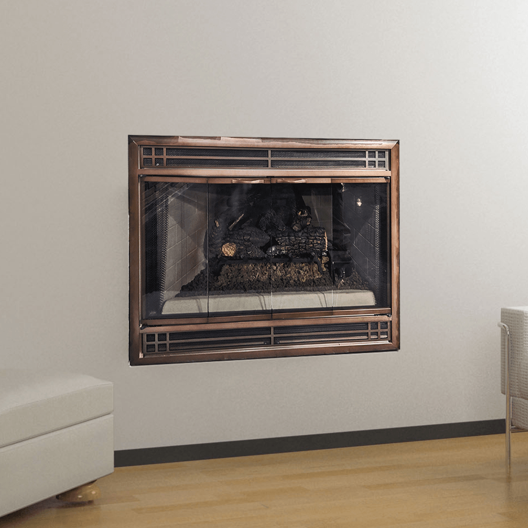 Fireplace built into a white wall with copper trim, and wooden floor.