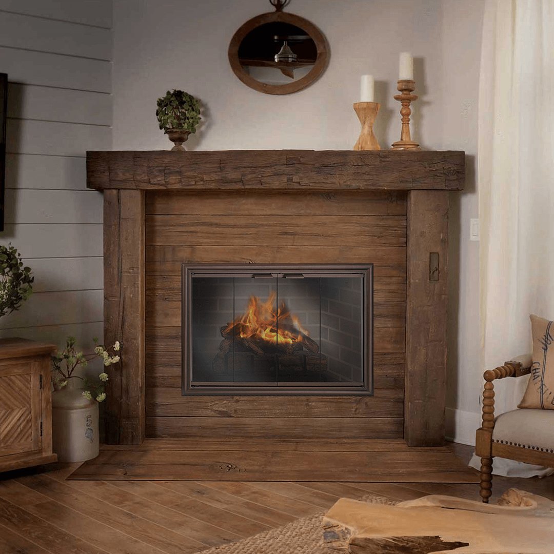 Rustic wooden fireplace with flames, candles, and a wooden mantle.