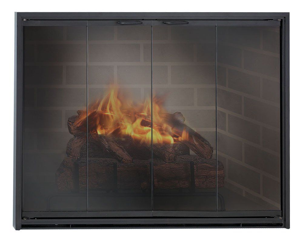 Fireplace with a burning fire behind glass doors. Brick background, black frame.