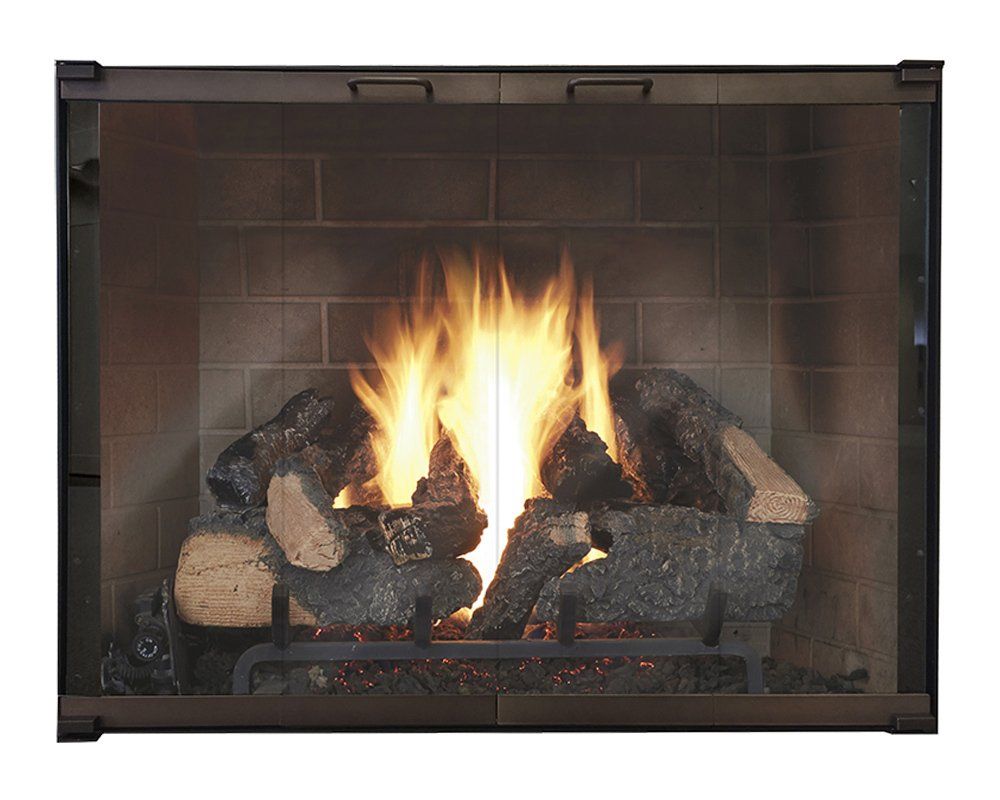 Fireplace with burning logs behind a mesh screen.