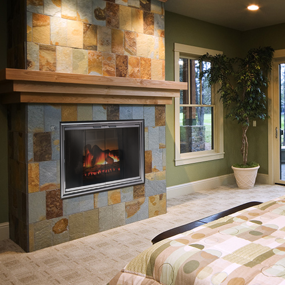 Fireplace with stone surround, wooden mantel, and electric fire, in a bedroom with window and plant.