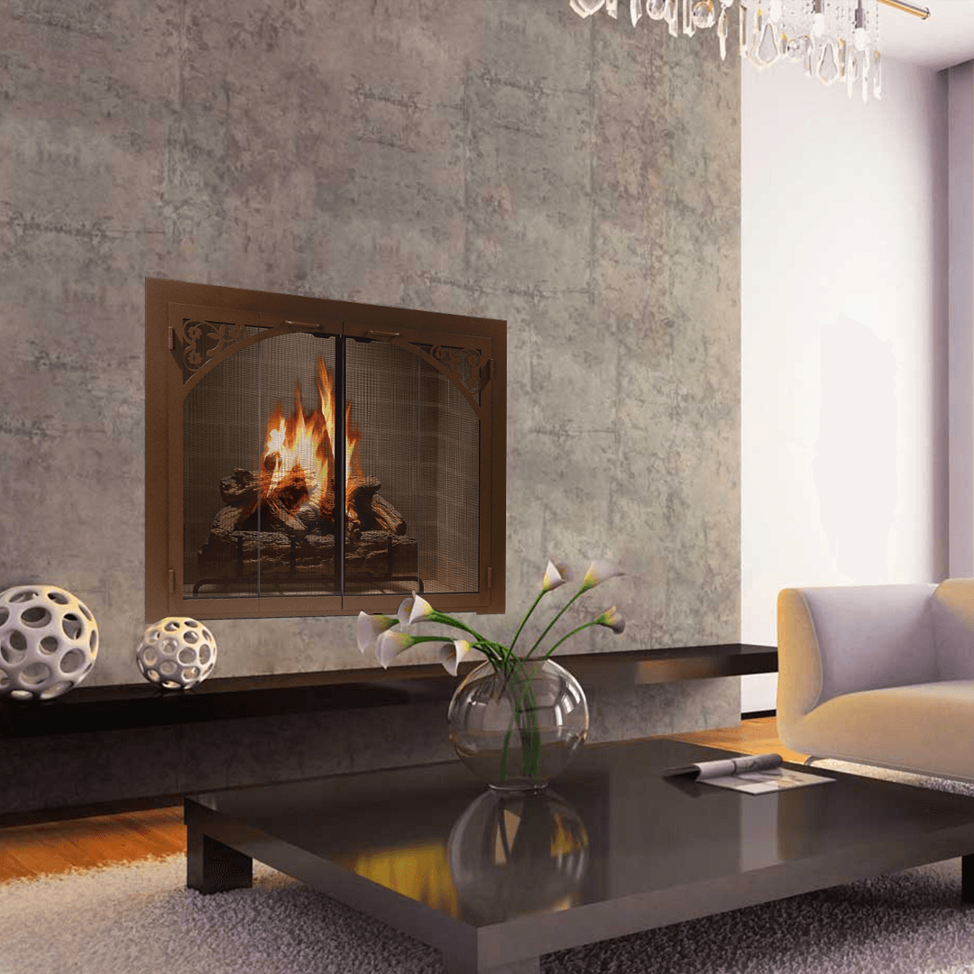Fireplace with flames, decorated with art in modern living room, with a coffee table, and couch.