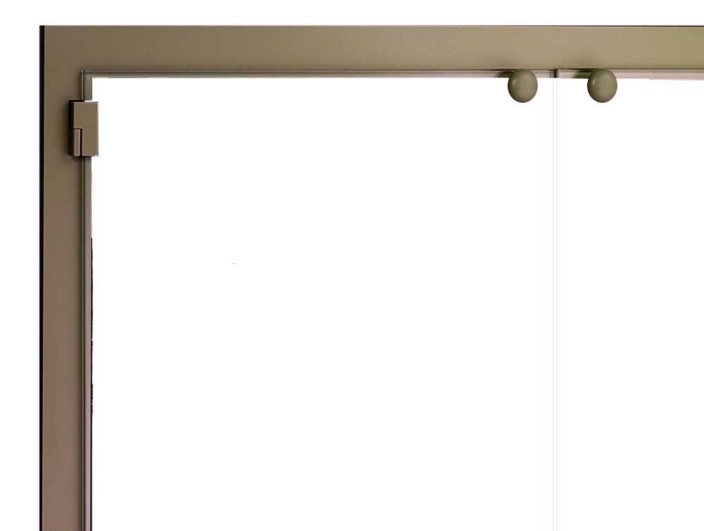 Close-up of a glass shower door and frame in a neutral color with rollers and a door latch.