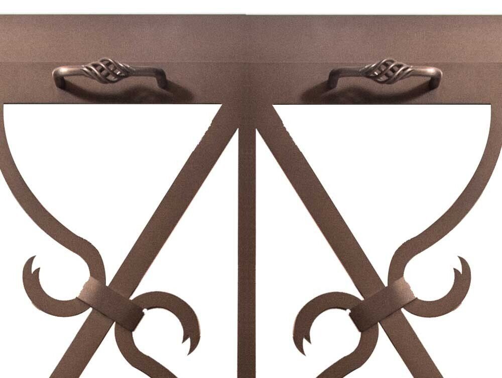 Bronze metal gate with decorative handles and stylized arch design.
