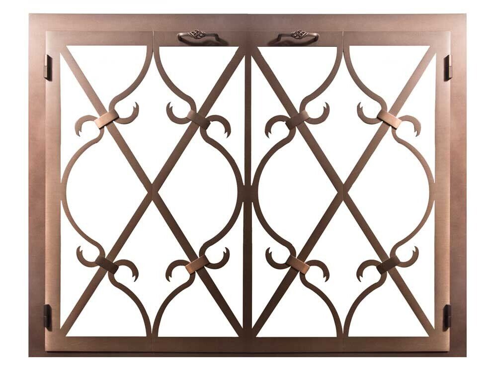 Bronze fireplace screen with ornate scrolled metalwork.