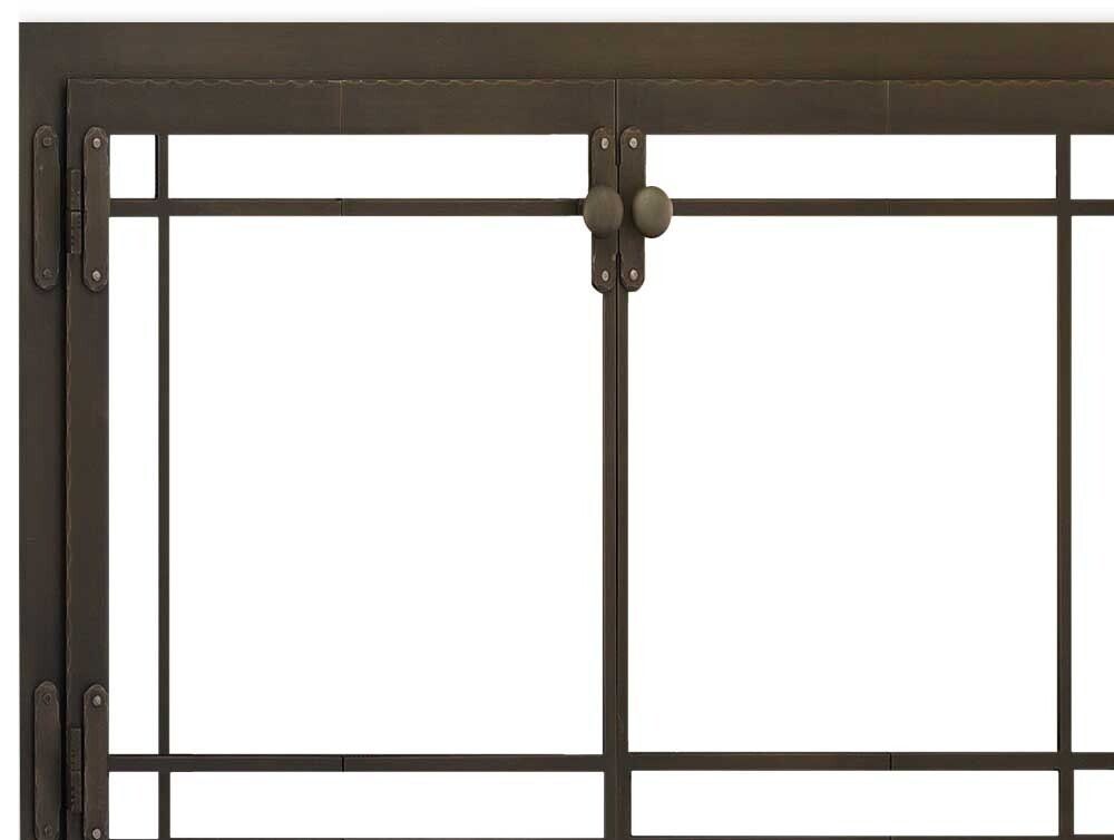Bronze-framed window with a latch, divided into rectangular panes, against a white background.