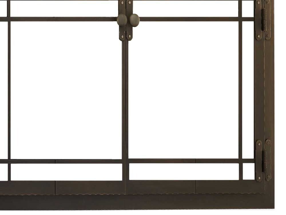Dark bronze window frame with decorative horizontal and vertical bars and hardware.