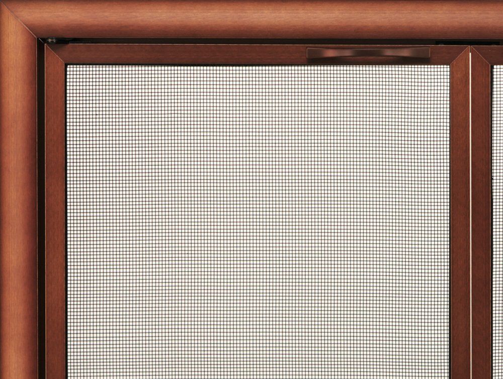 Bronze window screen close-up; shows a mesh grid within a wooden frame.