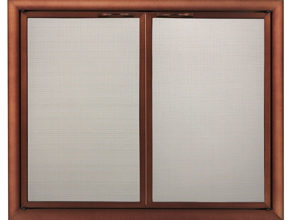 Brown-framed window with two panes covered by a checked screen.