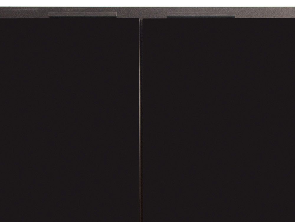 Two dark cabinet doors slightly ajar, bronze trim.