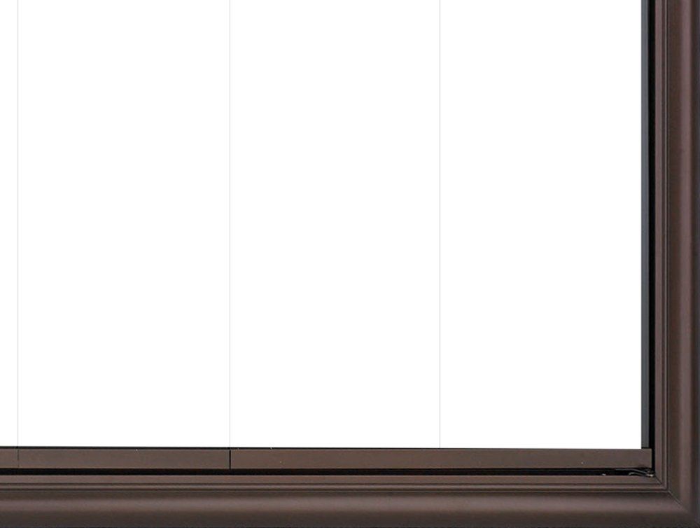Bronze-framed window with three vertical panes; white background.