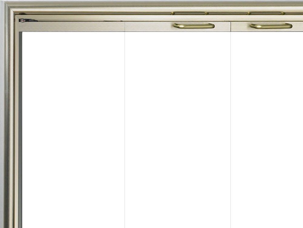 Sliding glass door, metallic frame with gold handles, interior view.