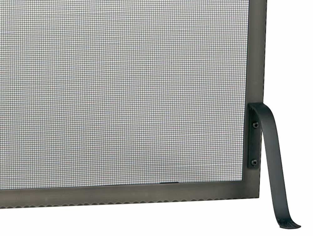 Close-up of a fireplace screen with a dark mesh and a dark metal frame and foot.