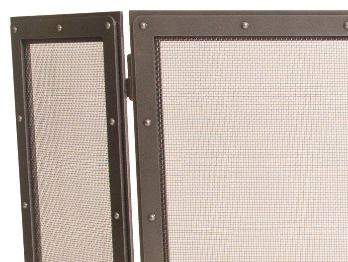 Two hinged fireplace screens with dark frames and mesh panels.
