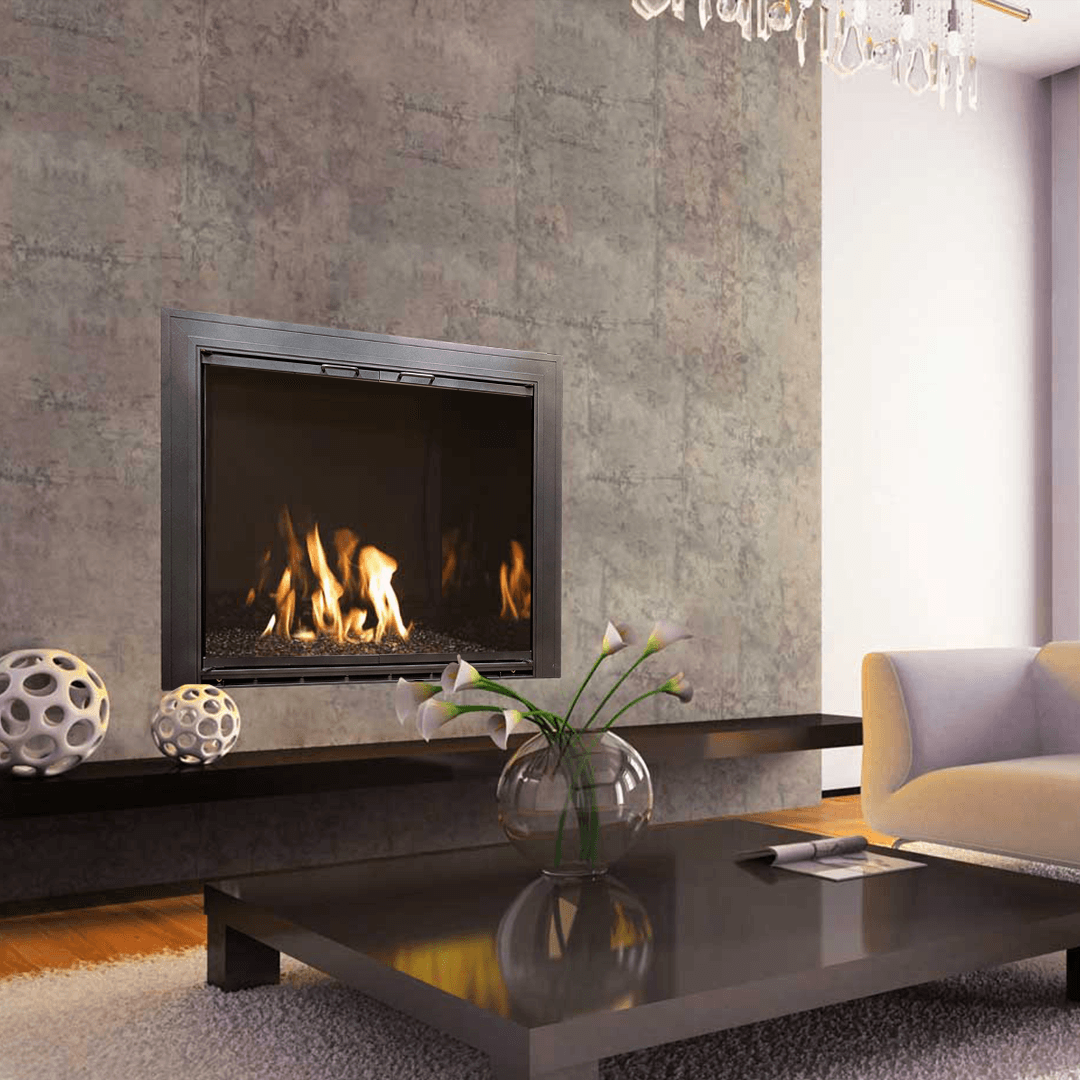 A modern fireplace with flames, built into a textured gray wall, next to a black table and beige sofa.