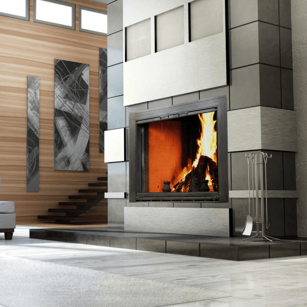 Modern fireplace with a burning fire, surrounded by gray tiles and a wooden wall.