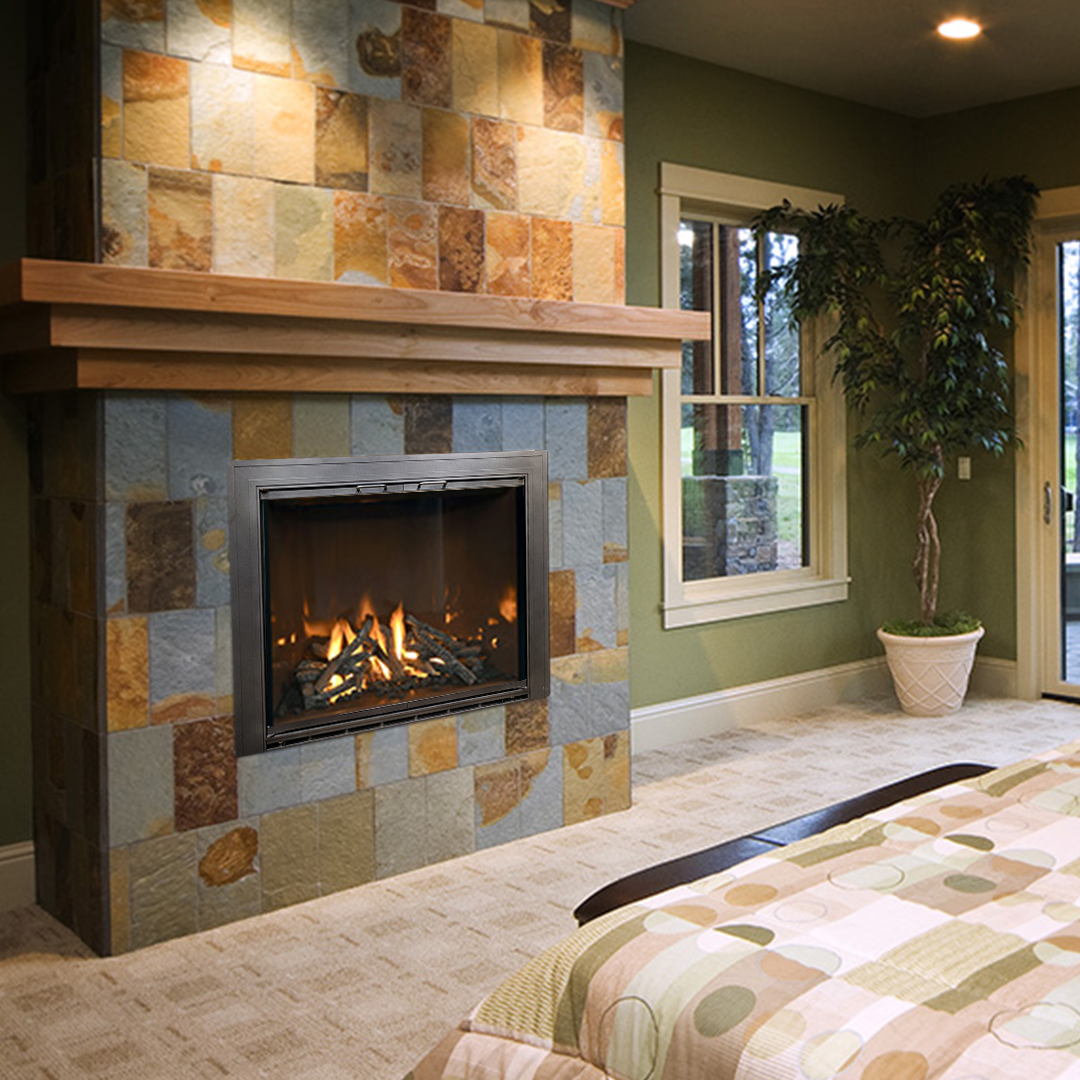 Fireplace with stone surround, wooden mantel, and flames. Adjacent to a window and a potted plant in a room.