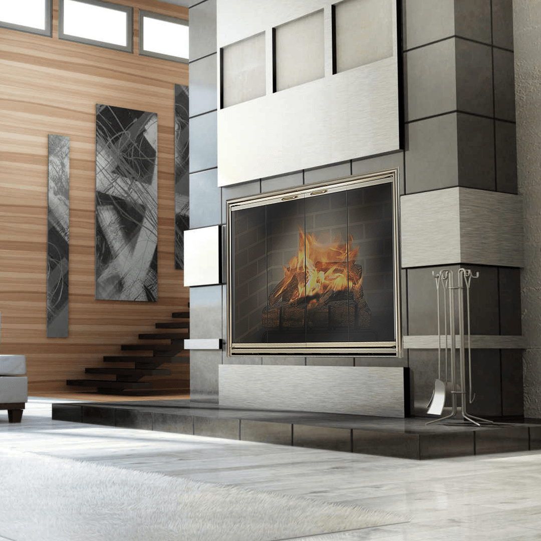 Modern fireplace with silver surround and hearth, lit fire, gray and wood walls, art.