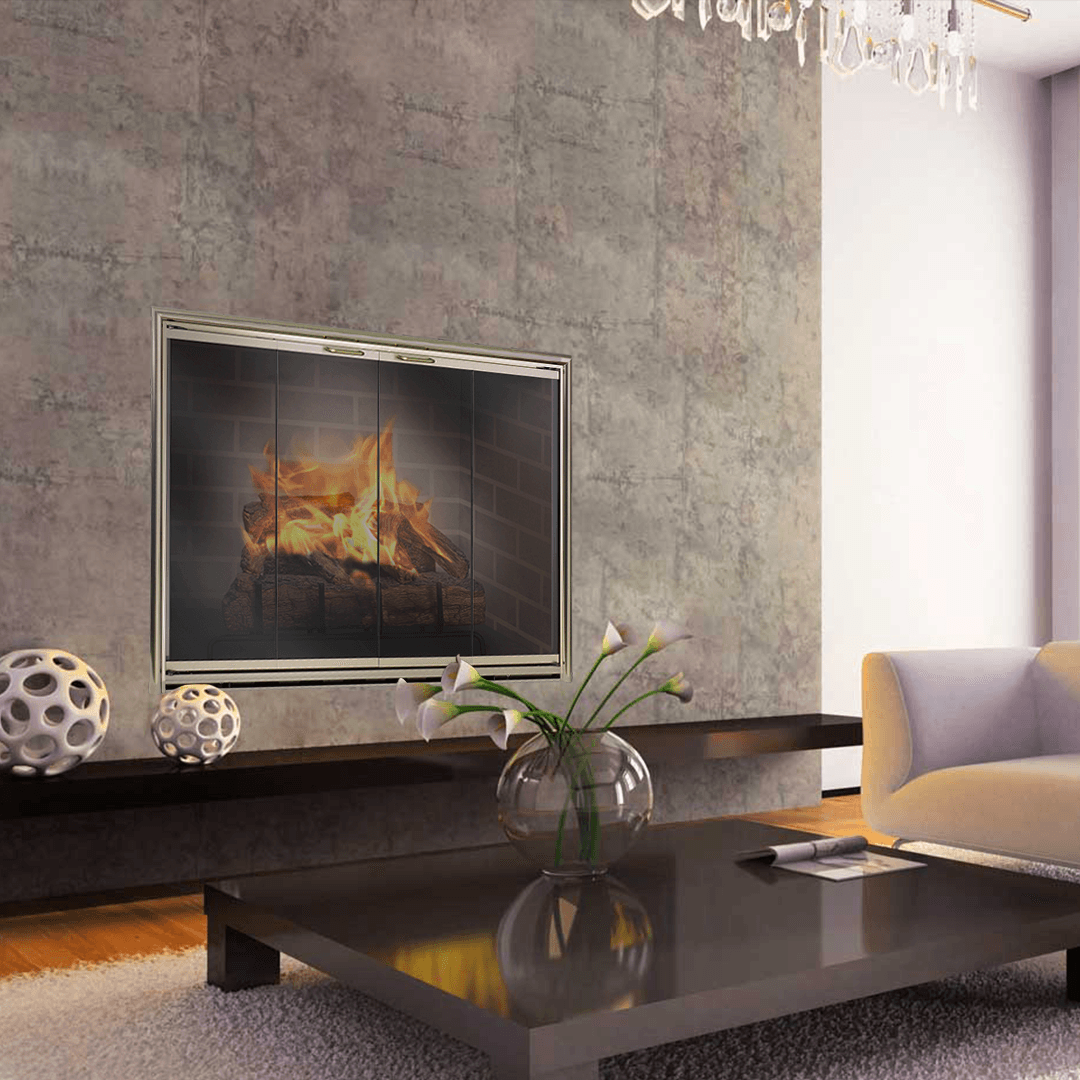 Fireplace with burning logs, built into a concrete-style wall, with a black table and modern couch in a living room.