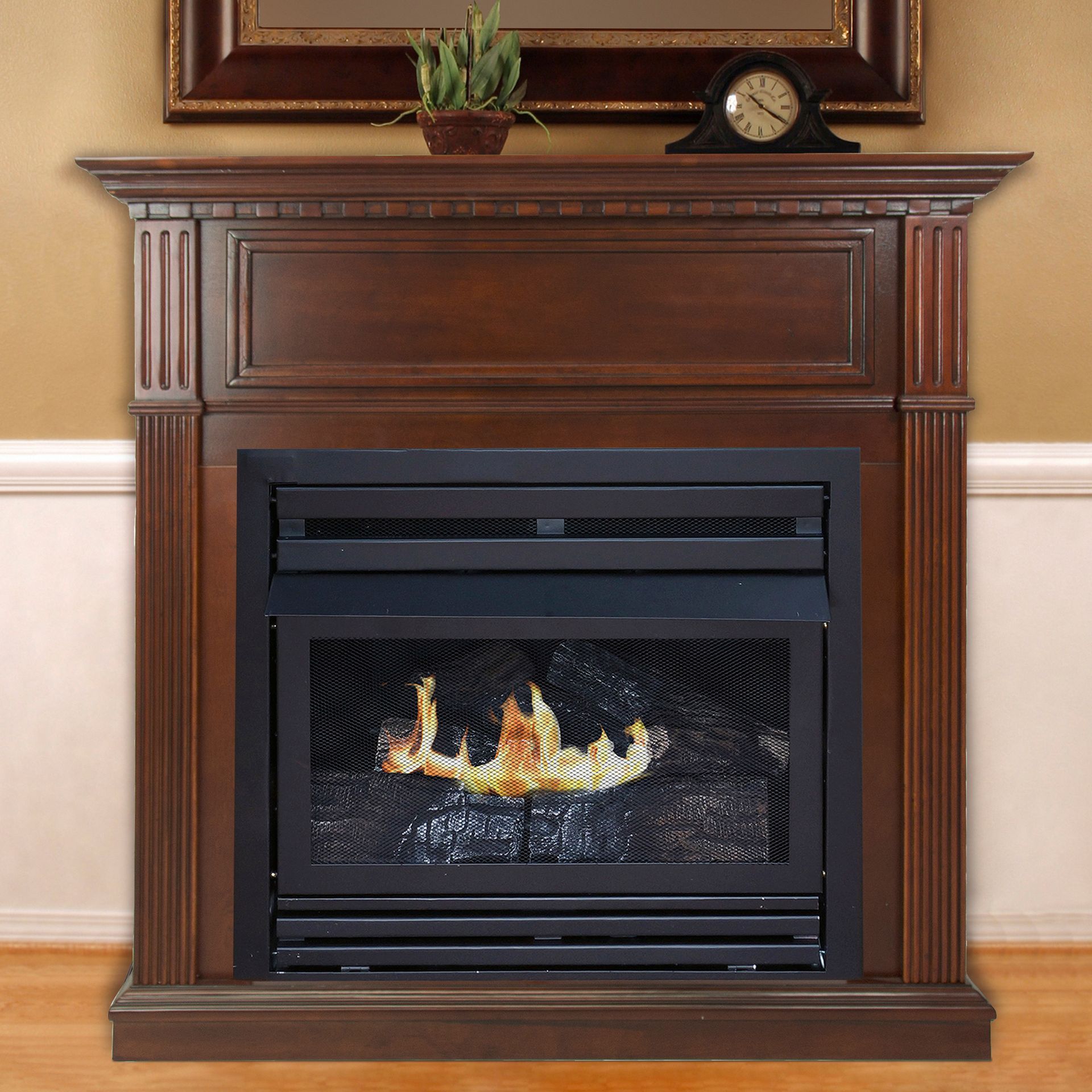 Fireplace with a dark wood mantel, with burning flames visible behind a black mesh screen.