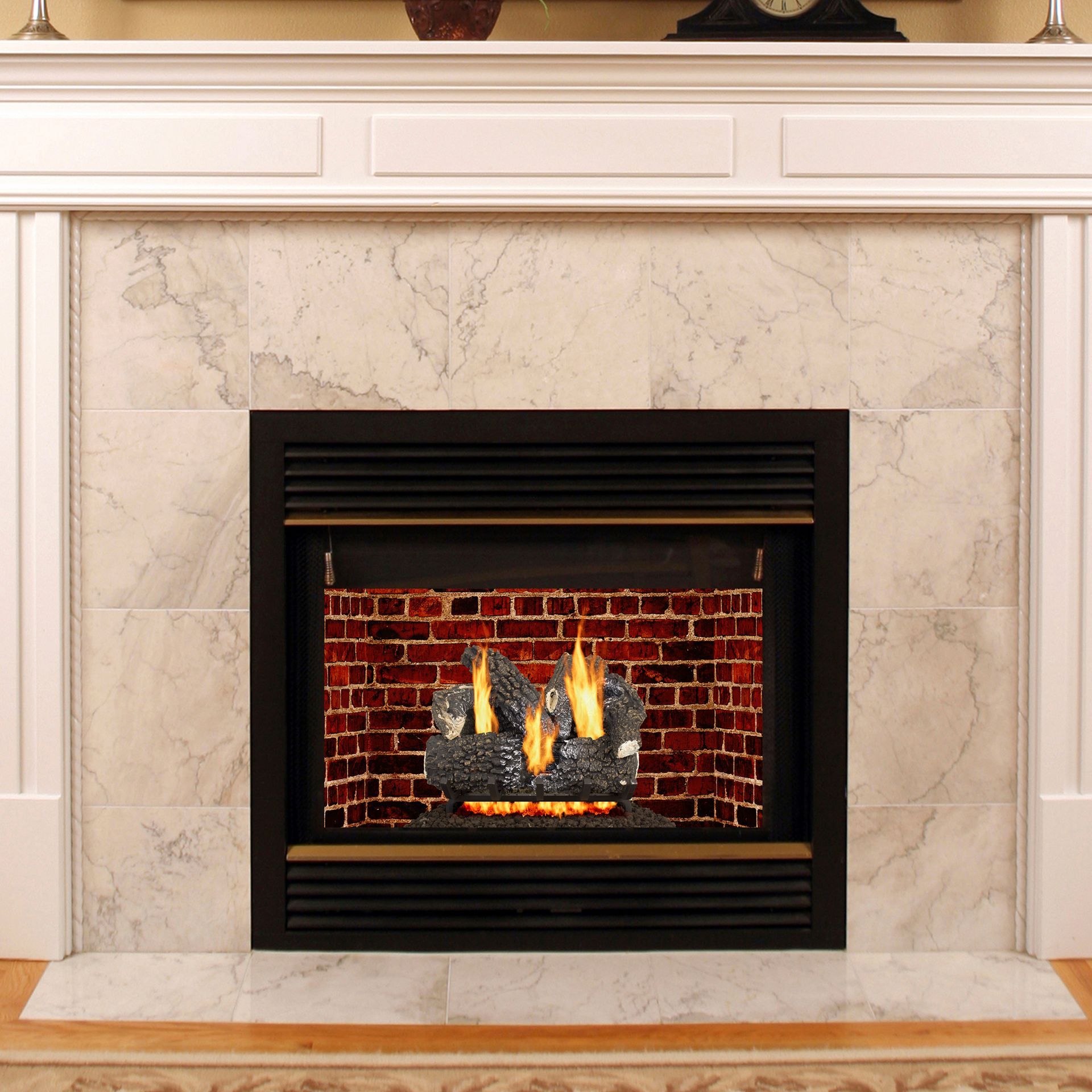Fireplace with burning logs, brick interior, black metal frame, and marble surround.