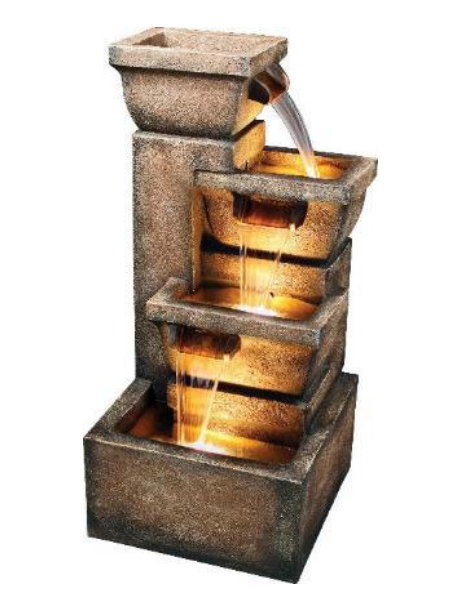 Stone tiered fountain with water flowing into each level; illuminated.