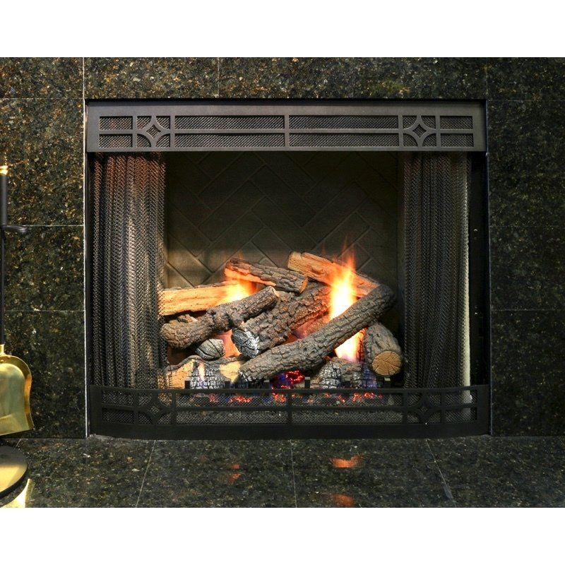 Fireplace with burning logs, black metal screen, and granite surround.