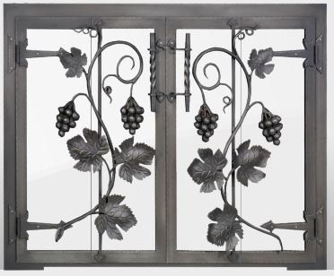 Iron fireplace screen with grape vine design.