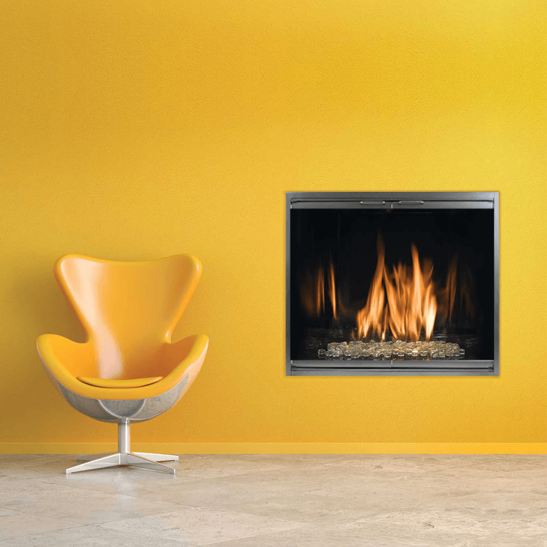 Yellow wall with a modern fireplace and a yellow armchair.
