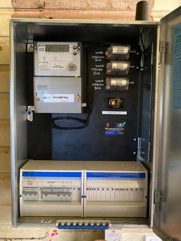 The Inside of a Metal Box With a Meter on Top of It — Mick Sawtell Electrical Pty Ltd in South Lismore, NSW